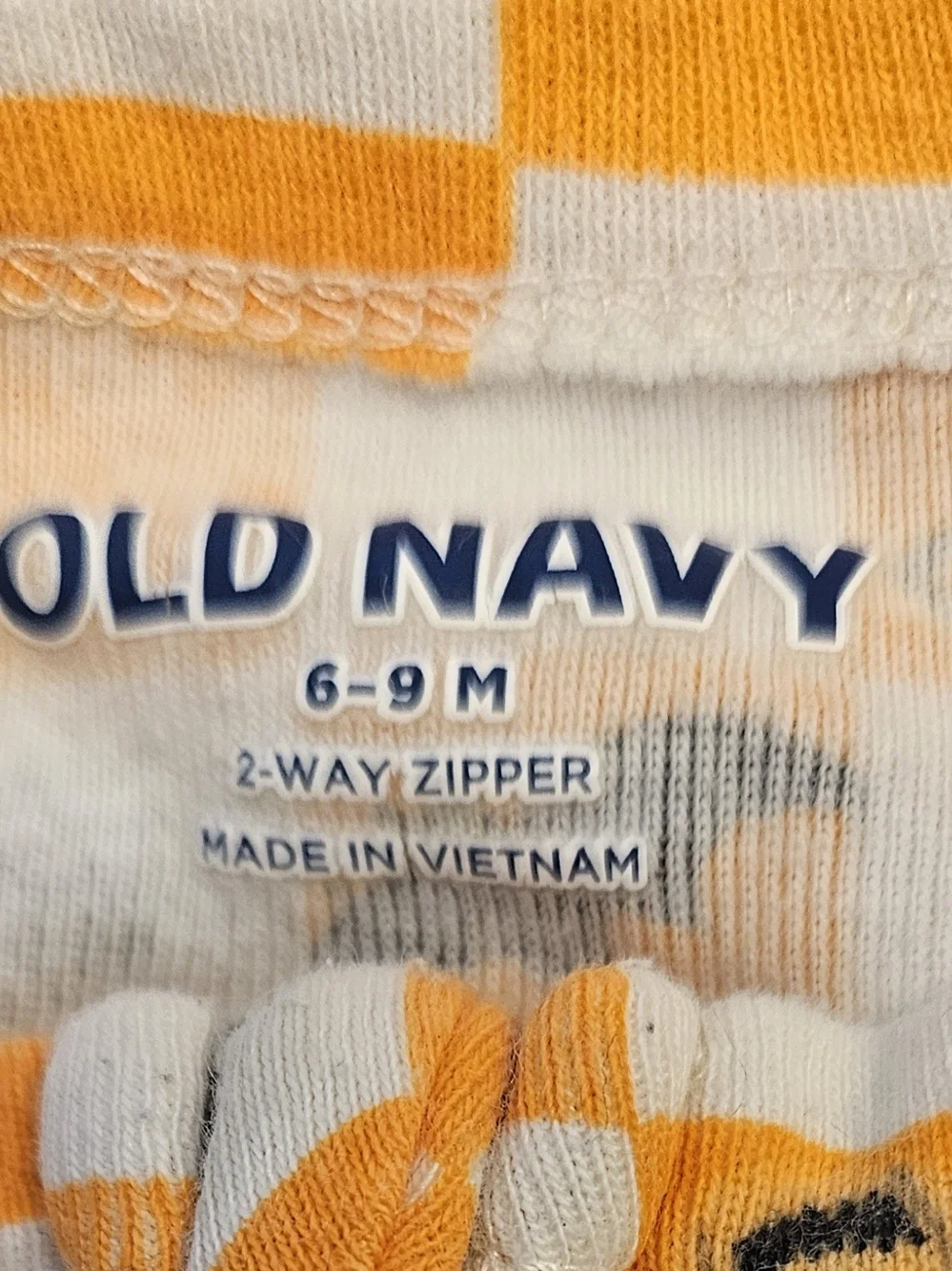 Old Navy Orange and White Halloween Checkerboard Footed One-Piece Zip-Up